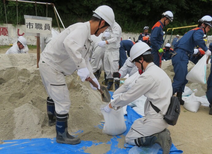 画像：水防訓練と平洲コミュニティによる大雨避難行動訓練